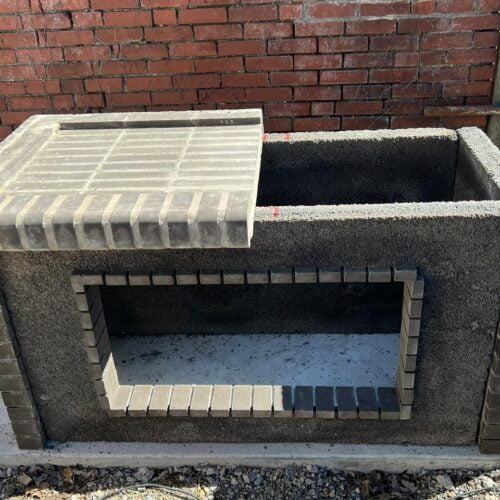 Black firebrick bbq and rotisserie for whole lamb pig