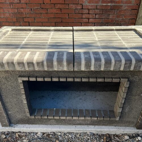 Black firebrick bbq and rotisserie for whole lamb pig