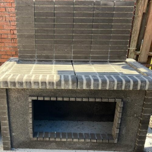 Black firebrick bbq and rotisserie for whole lamb pig